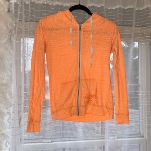 Bright orange light zip up